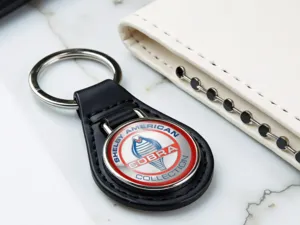 Shelby Porte-clé Cuir Simili Robuste Design Sportif